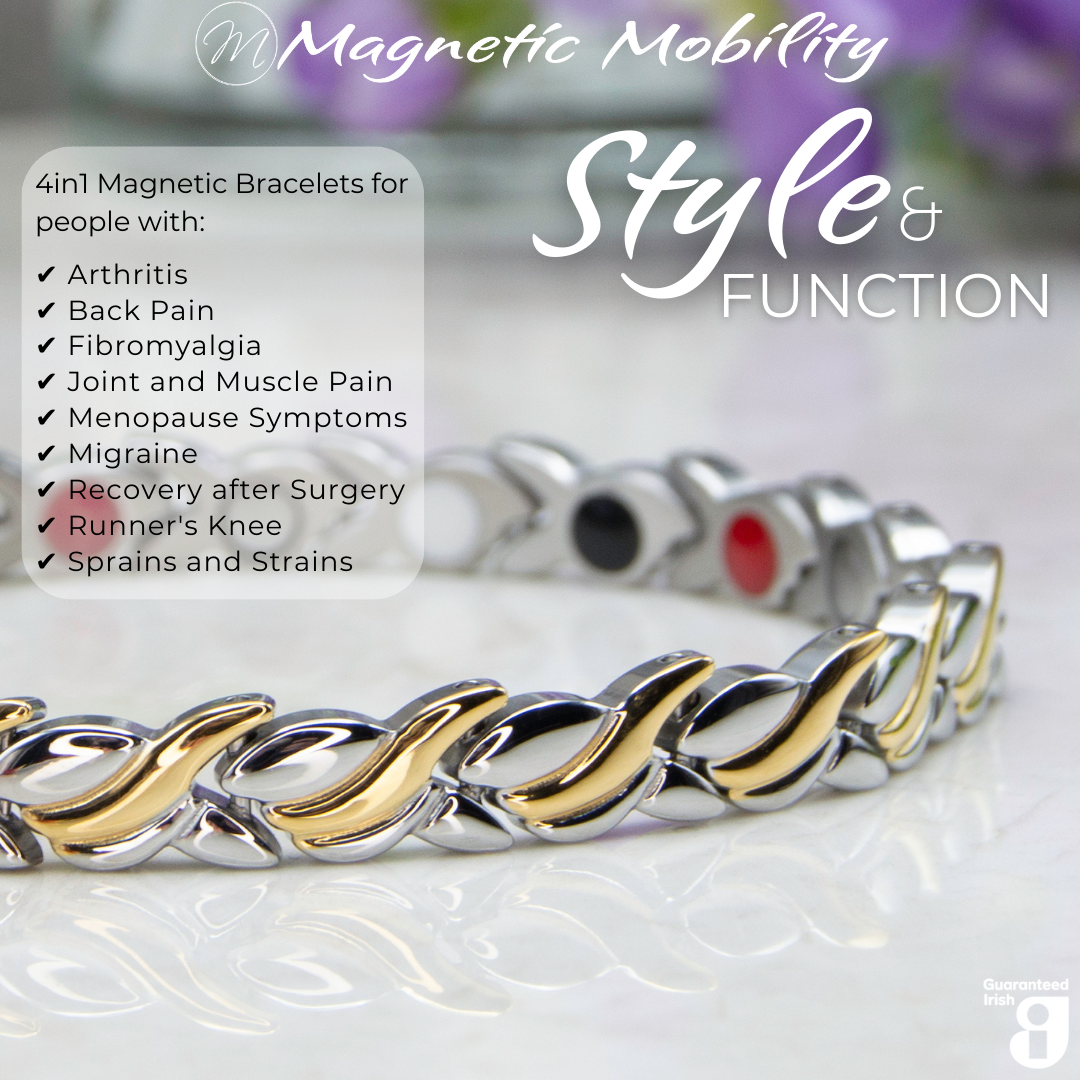 Close up view of the Virginia moon 4in1 Magnetic Bracelet from Magnetic Mobility. Features and intricate Silver and Gold twist with the 4in1 elements hidden in the back. Perfect for people with arthritis, back pain, fibromyalgia, joint and muscle pain, menopause symptoms, migraine and more. The bracelet is shown on a reflective surface with purple flowers behind it.