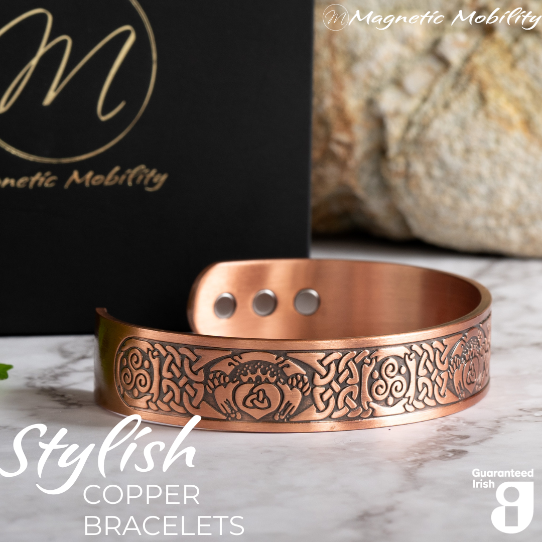 Close up view of the Claddagh design on this Claddagh Copper Magnetic Bracelet from Magnetic Mobility. 3 Magnets are also visible on the back of the bracelet.