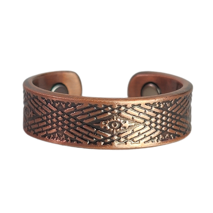 Hawthorn copper ring by Magnetic Mobility featuring an intricate geometirc design. This adjustable ring is designed to be easily worn on arthritic fingers, providing both style and functionality.
