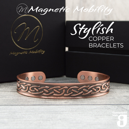 Front view of the Trefoil Copper bracelet from Magnetic Mobility. A copper bracelet with a Celtic design. Featuring 6 strong neodymium magnets. Perfect for people with arthritis and back pain. 99% pure copper. the image shows the bracelet in front of a black gift box